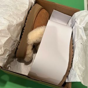 UGG Disquette platform slippers.